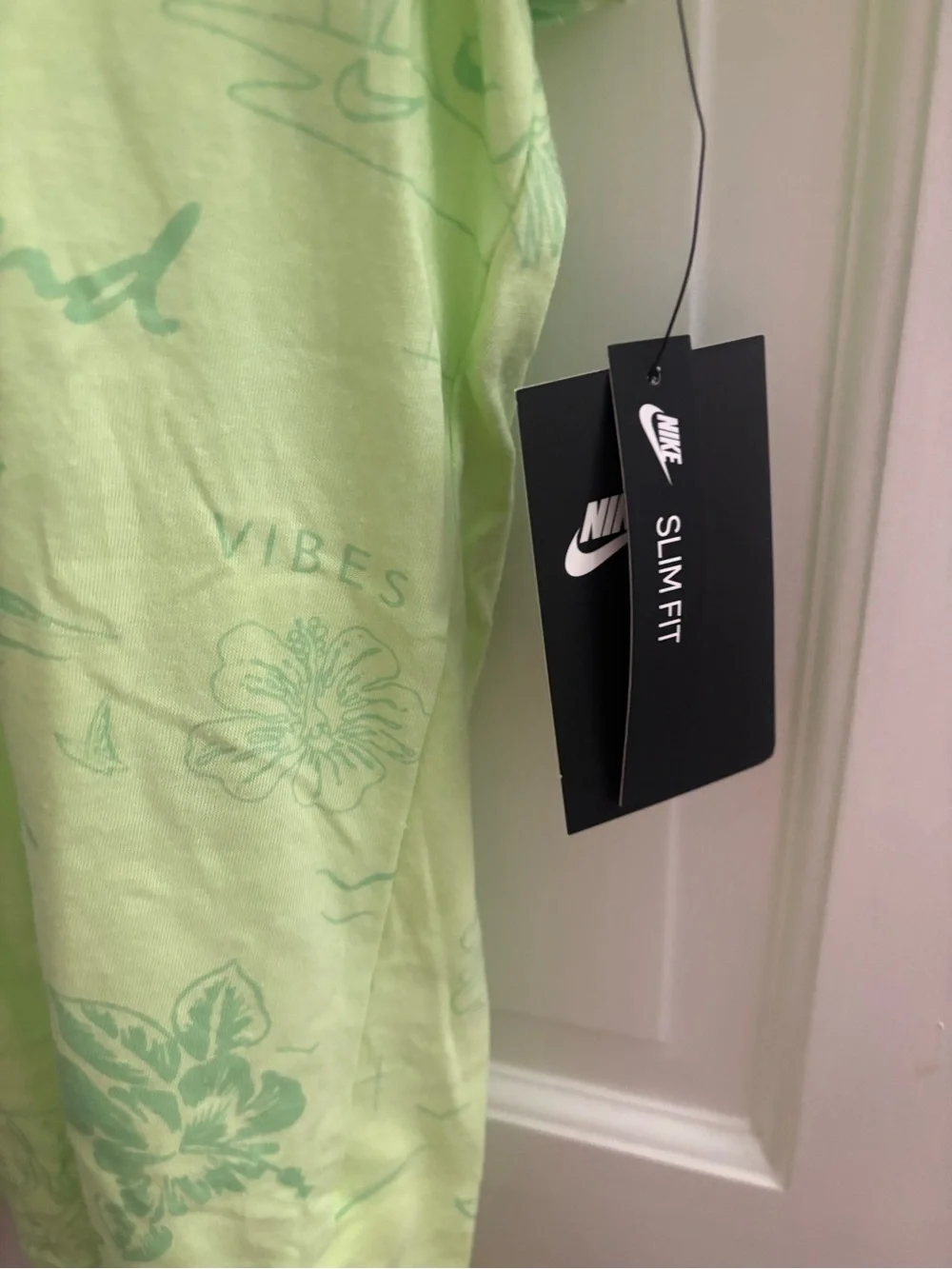 Nike Short-Sleeve Neon Green Tropical Graphic Tee with Multicolor Logo